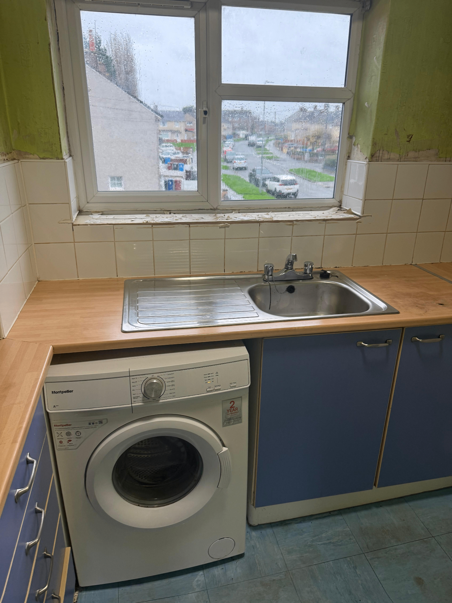 Cleaned kitchen sink and counter area after hoarder clearance